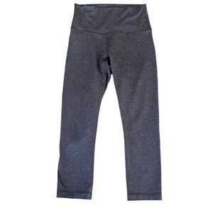 Lululemon size 6 Wunder Under high rise crop leggings in dark grey.